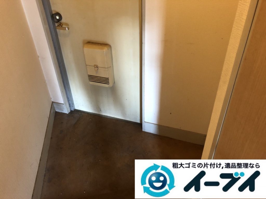 2019年1月6日大阪府大阪市大正区でコタツや生活用品に溢れた部屋の片付け作業。写真4